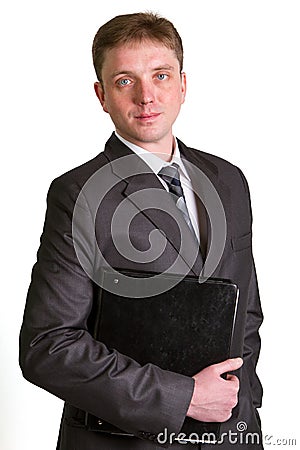 Portrait of happy smiling businessman with folde Stock Photo