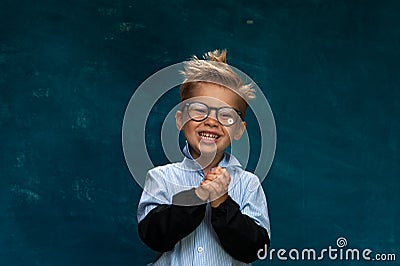 Portrait of happy smiling child with eyeglasses Stock Photo