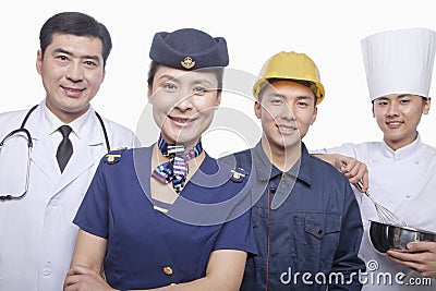 Portrait of Happy and Smiling Doctor, Air Stewardess, Construction Worker, and Chef- Studio Shot Stock Photo