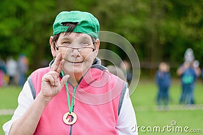 Portrait of happy smiling handicaped lady Editorial Stock Photo