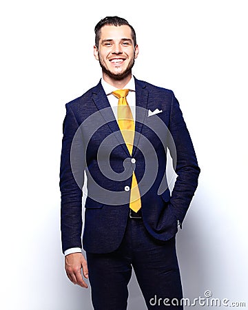 Portrait of happy smiling young businessman, isolated on white Stock Photo