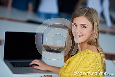 Portrait of happy smilling student girl at tech classroom Stock Photo