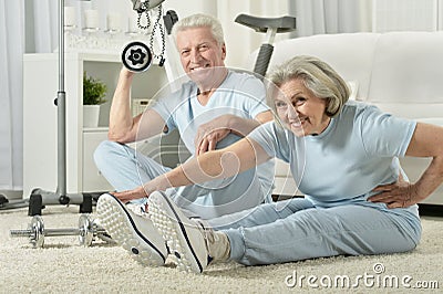 Portrait of happy sporty senior couple exercising Stock Photo