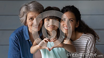 Portrait of happy three generations of Latino women Stock Photo