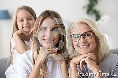 Portrait of happy three women generation grandma mom and child Stock Photo