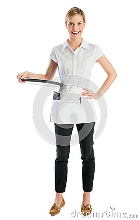 Portrait Of Happy Waitress With Serving Tray Stock Photo