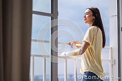 Portrait happy woman with disability prosthetic arm relaxing at home, disabled cyborg girl normal life artificial Stock Photo