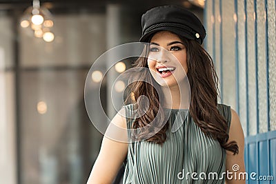 Portrait of happy woman in french style hat Stock Photo