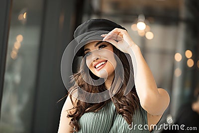 Portrait of happy woman in french style hat Stock Photo