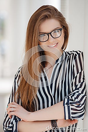 Portrait of a happy woman in spring city Stock Photo