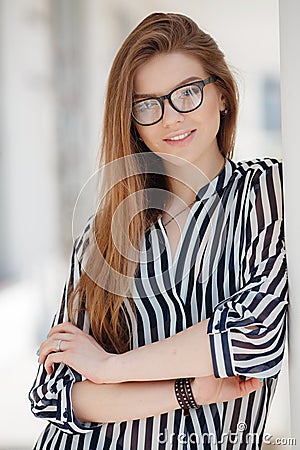 Portrait of a happy woman in spring city Stock Photo