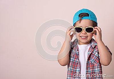 Portrait of Happy 4 year little boy, smiling on isolated background. Stock Photo