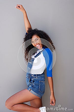 Happy young african american woman punching the air Stock Photo