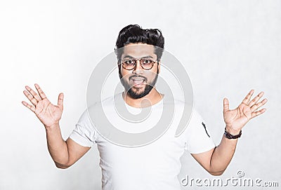 Portrait of a happy young handsome Hindu man. Stock Photo