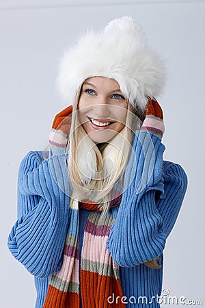 Portrait of happy young woman at wintertime Stock Photo