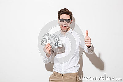 Portrait of a hapy young man dressed in shirt Stock Photo