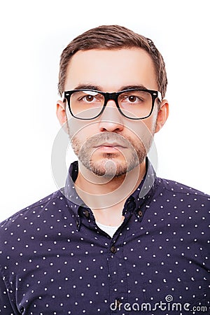 Portrait of hapy young smart man in glasses on white background Stock Photo