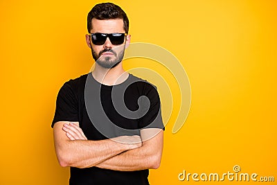 Portrait of harsh masculine guy safeguard worker cross hands feel he real professional in career wear good looking black Stock Photo