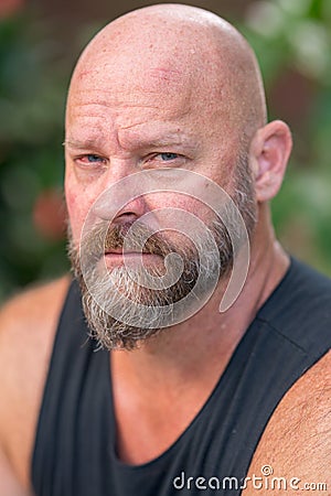 Portrait headshot handsome man staring directly into camera Stock Photo