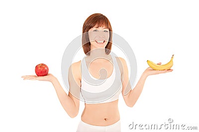 Portrait of healthy woman with apple and banana Stock Photo