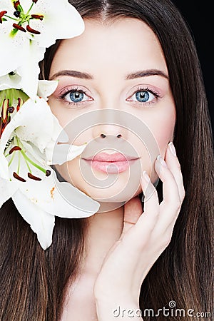 Portrait of Healthy Woman with Lily Stock Photo