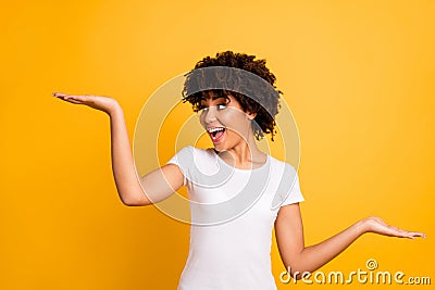 Portrait of her she nice lovely attractive cheerful glad crazy optimistic wavy-haired girl holding two palms copy empty Stock Photo
