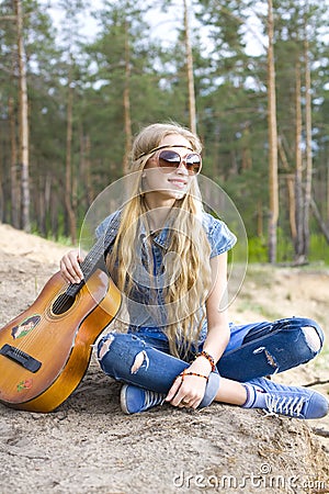 Portrait of a hippie girl in the woods Stock Photo