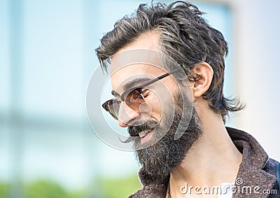 Portrait of hipster guy with confident face expression - Autumn Stock Photo