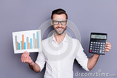 Portrait of his he nice attractive smart clever skilled cheerful cheery brunet guy financier holding in hands showing Stock Photo