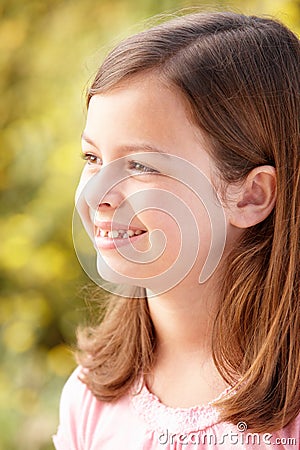 Portrait Hispanic girl outdoors Stock Photo