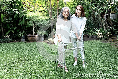Portrait images of Asian caregivers or nurse and elderly woman Who are doing physical therapy Stock Photo
