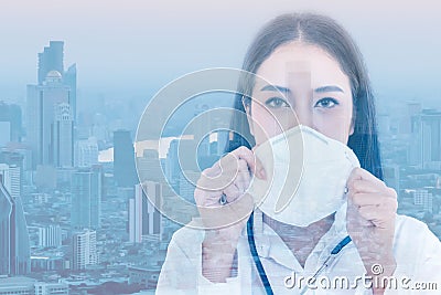 Portrait images of Asian woman doctor holding a mask Stock Photo