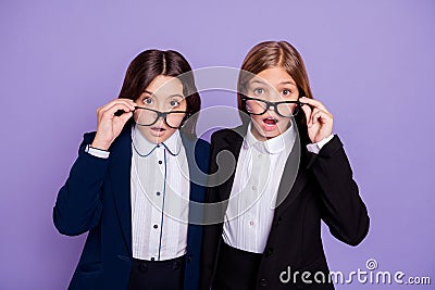 Portrait of impressed children touch specs stupor isolated over purple violet background Stock Photo