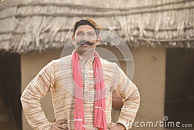 Portrait indian man standing at his house in village Stock Photo