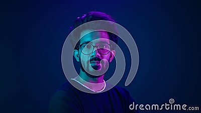 Portrait Indian serious man developer coding worker programmer profile looking to side turn head internet technology Stock Photo