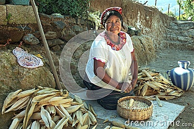 Portrait of Indian woman during peeling corn Editorial Stock Photo