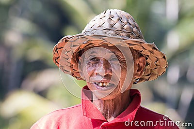 Portrait of an indonesian farmer smiling. Editorial Stock Photo