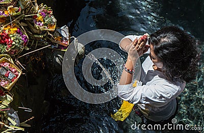Portrait of an indonesian woman praying. Editorial Stock Photo