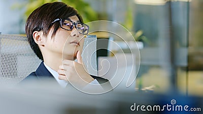 Portrait of the Japanese Businessman Wearing Suit and Glasses, S Stock Photo