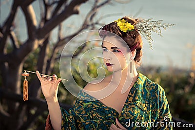 Portrait of a Japanese Geisha in kimono Stock Photo