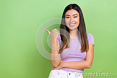 Portrait of japanese young woman advertiser direct finger mockup useful information promo code discount isolated on Stock Photo