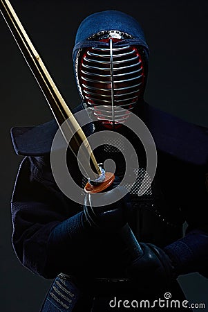 Portrait of a kendo fighter with shinai Stock Photo