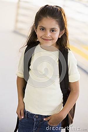 Portrait of kindergarten girl with backpack Stock Photo