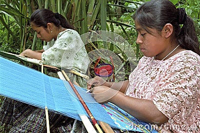 Portrait latino Indian women weaving on hand loom Editorial Stock Photo