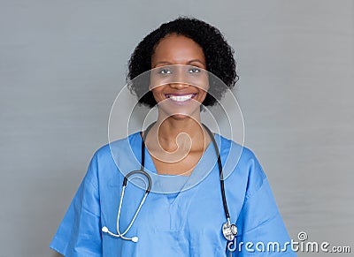 Portrait of laughing african american nurse Stock Photo