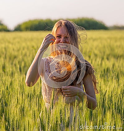 Portrait of a laughing girl with matted hair Stock Photo