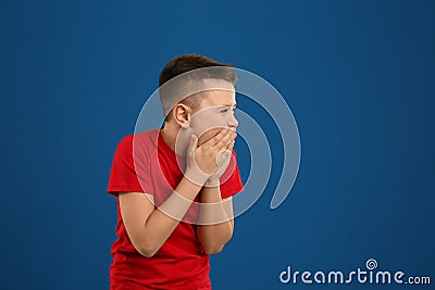 Portrait of laughing preteen boy on background, space for text Stock Photo