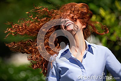 Portrait of laughing young woman Stock Photo