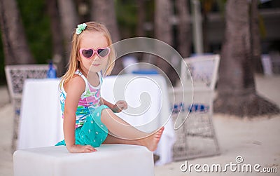 Portrait of little adorable girl on a tropical Stock Photo