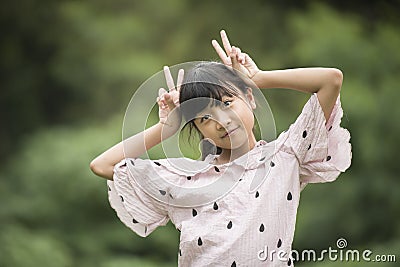 Portrait of Little Asian Girl Show Emotion Stock Photo